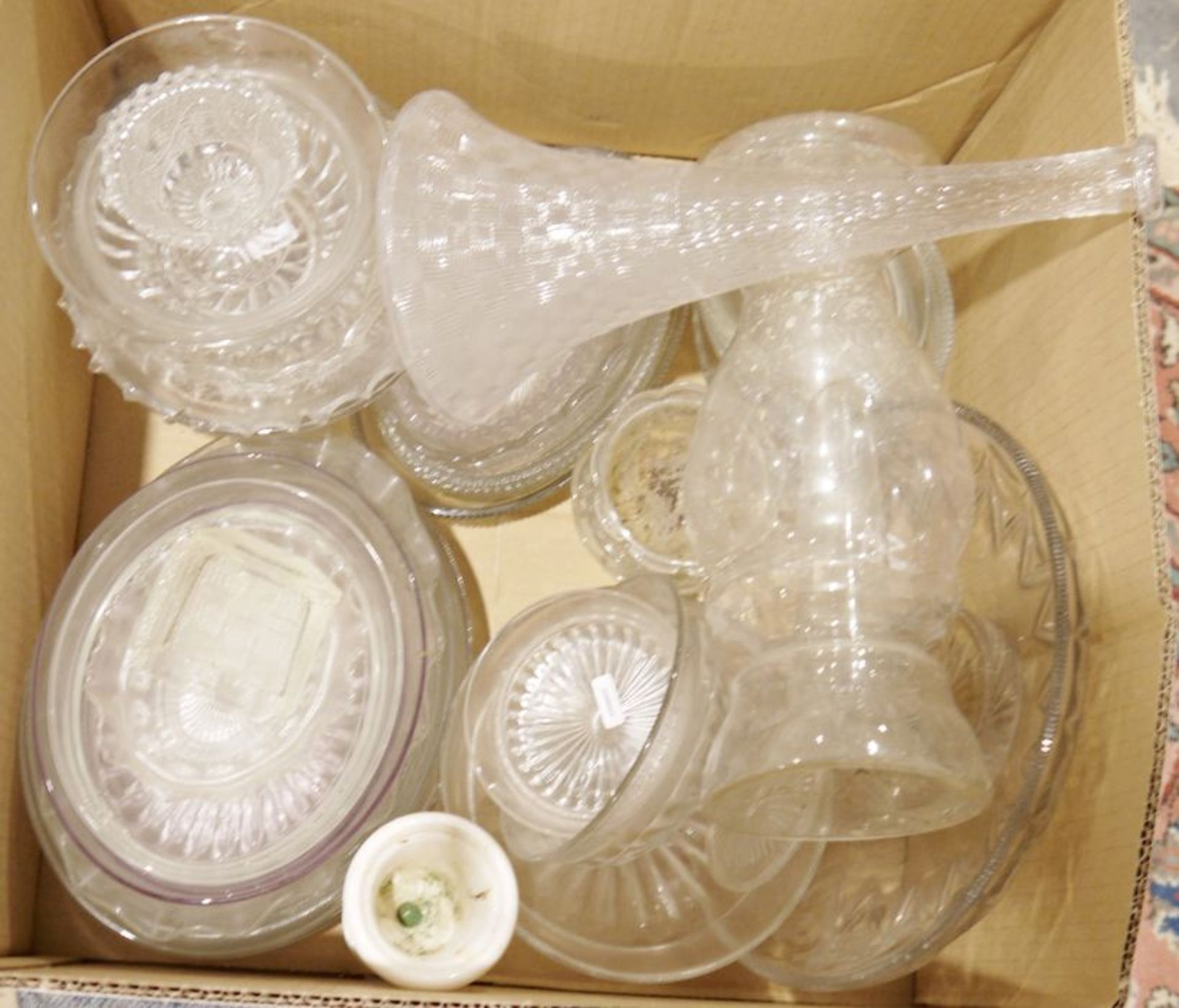 Two boxes of assorted glassware to include vases, bowls, etc