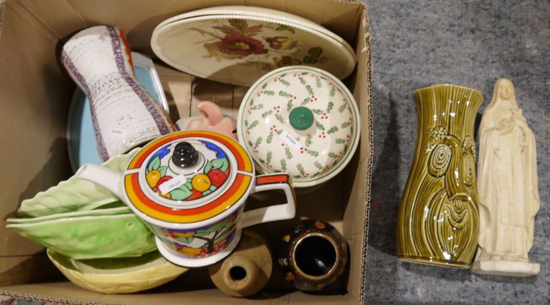 Pair of Clarice Cliff 'Newport' pottery plates with floral decoration, an Emma Bridgewater '