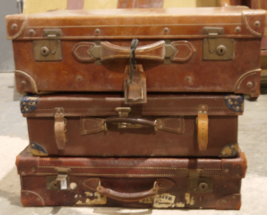 Three vintage leather suitcases (3)
