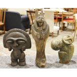 Hardstone model of Anubis, an African Shona stone, an abstract sculpture of two figures and a