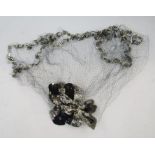 1920's/30's head piece with silver and black sequinned bows, with net sequin veil