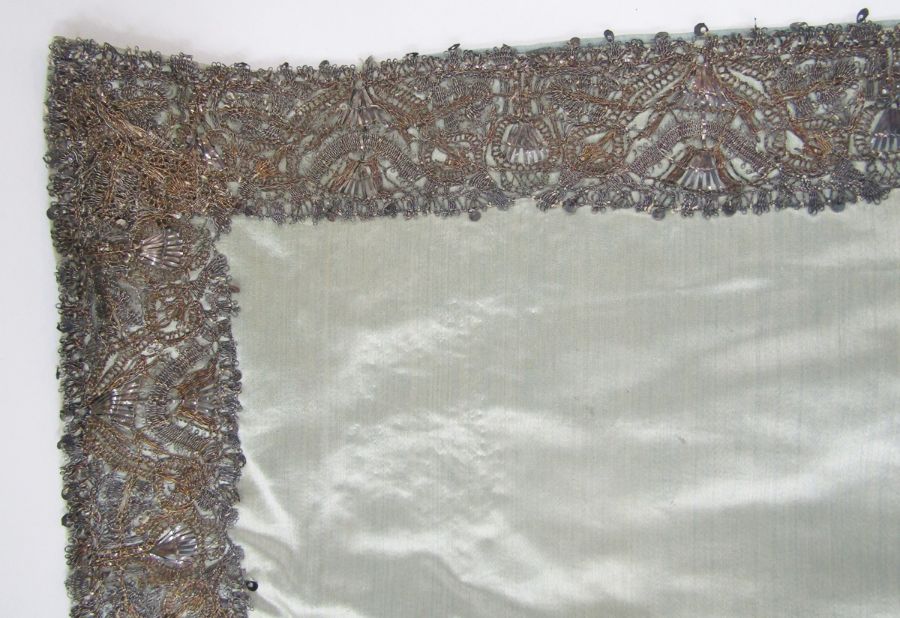 Length of 17th century silver and silver-gilt lace as a border, 6cm wide, on pale blue silk cloth, - Image 24 of 24