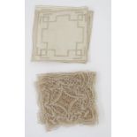 Various table linens to include a large crochet table cloth, lace mats, embroidered linen mats and