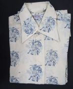 Two 1970's mens shirts, one labelled 'Brutus' with a printed design of the Statue of Liberty, the