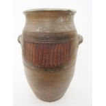 Large 20th century two-handled brown stoneware jar, with ribbed bands and two loop handles, 57.5cm