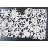 Antique panel of Venetian grospoint needlepoint lace, floral design with raised cordonnet, 80cm long