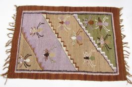 South American woven kilim rug, bee design in brown, purple and green,1983, 61cm x 88cm