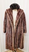 A vintage brown mink coat labelled "De Bella fashion perfect furs", with a dark mink hat (2)