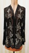 A vintage black chiffon jacket embroidered with small square glass beads and faux jet, elaborate