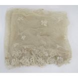 Two lengths of lace net wide borders, floral spray decorated and floral edging, possibly bobbin