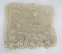 Two lengths of lace net wide borders, floral spray decorated and floral edging, possibly bobbin