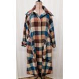 A 1970's oversized check wool coat labelled "Lee Bender at Bustop" size 14 with detailed cuffs