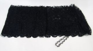 Deep length of black lace, possibly Spanish, 548cm long x 33cm deep approx.