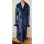 An Escada blue distressed leather coat, lined and trimmed with blue rabbit fur, four clip