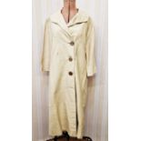 1940's raw silk cream duster/driving coat with three button fastening, three-quarter length sleeves,