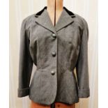 1940's grey wool jacket, fitted at the waist, with black velvet collar, three-quarter length sleeves