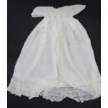 Assorted silk and cotton babygowns, lace trimmed, crocheted, woollen blankets, sheets, crocheted