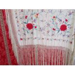 Large Chinese silk embroidered shawl with peonies and other floral detail, with a deep silk fringe