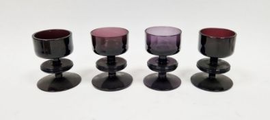 Four Wedgwood "Sheringham" glass candlesticks designed by Ronald Stennett-Wilson, with one ring,