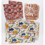 Collection of ethnic fabrics and bags including kilim bags, two silk scarves, a length of cotton