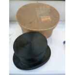 VINTAGE BLACK SILK TOP HAT. Initialled inside, leather internal rim, within a Dunn and Co. hat box