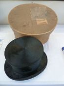 VINTAGE BLACK SILK TOP HAT. Initialled inside, leather internal rim, within a Dunn and Co. hat box