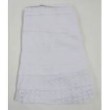 White cotton apron with a lace and whitework bib, two Victorian nightgowns both pintucked broderie