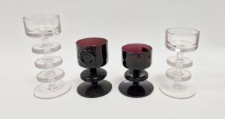 Four Wedgwood "Sheringham" glass candlesticks designed by Ronald Stennett-Wilson, to include a clear