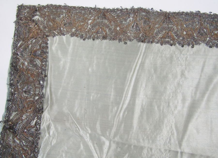 Length of 17th century silver and silver-gilt lace as a border, 6cm wide, on pale blue silk cloth, - Image 15 of 24