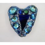 Andrew Logan heart brooch set blue stones, a blue triangular centre, signed and dated 2010 to