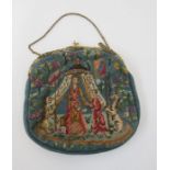 Vintage embroidered evening bag with figures wearing oriental dress, with griffin/lion to the