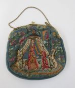 Vintage embroidered evening bag with figures wearing oriental dress, with griffin/lion to the
