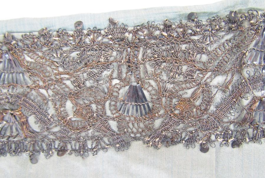Length of 17th century silver and silver-gilt lace as a border, 6cm wide, on pale blue silk cloth, - Image 4 of 24