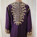 A dark purple with gold thread embroidery kaftan three quarter length bell sleeves, elaborate