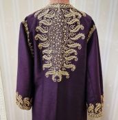 A dark purple with gold thread embroidery kaftan three quarter length bell sleeves, elaborate