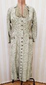 A mid twentieth century jacquard coat dress, full length, front button fastening, side pockets,