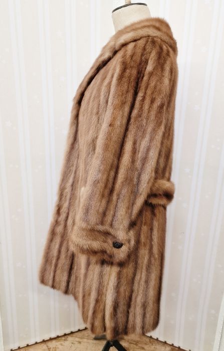 A 1960/70's brown mink coat, three quarter length half belt, button detail to the cuffs, side - Image 2 of 2