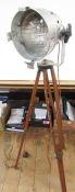 Vintage style metal and brass bound wood tripod spotlight on adjustable supports, and a vintage