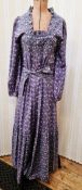 An early 1970's purple maxi dress with pintucked bodice and frilled neckline, elasticated cuffs,
