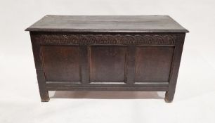 Antique stained oak coffer of rectangular form with carved floral frieze, 66cm high x 120cm wide x
