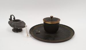 Black and brass inkstand, circular with hinged cover and a Danish pewter small oil lamp in the