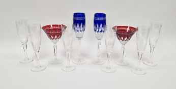 Two Waterford Clarendon ruby red cut glass martini glasses, two Waterford blue Clarendon cut glass