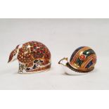 Two Royal Crown Derby bone china paperweights, the first modelled as an 'Armadillo' circa 1996,