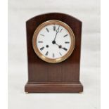 20th century arch topped mahogany cased mantel clock with brass bun feet, roman numerals, moon hands
