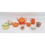 Group of Art Deco ceramics including a Clarice Cliff Bizarre beehive-shaped honeypot and cover, in