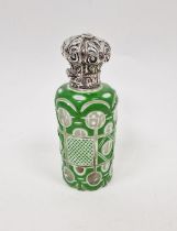 Victorian green cased engraved glass scent bottle, with embossed white metal mount and original