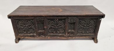 17th century possibly Irish oak coffer having a carved panelled front and sides, 49cm high x 146cm