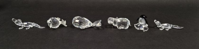 Six Swarovski crystal animal models to include a whale, a hippo, puffer fish, penguin, and two