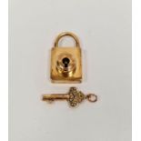 Gold-plated, diamond and seedpearl padlock and key, the padlock rectangular with metal mechanism,