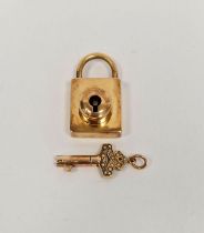 Gold-plated, diamond and seedpearl padlock and key, the padlock rectangular with metal mechanism,